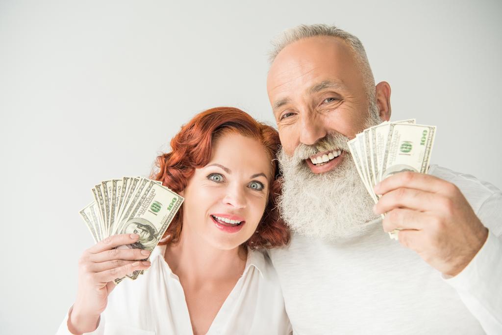 casal com notas de dólar
 - Foto, Imagem