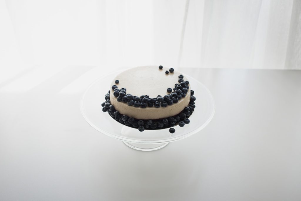 cheesecake with blueberries on glass stand - Photo, Image