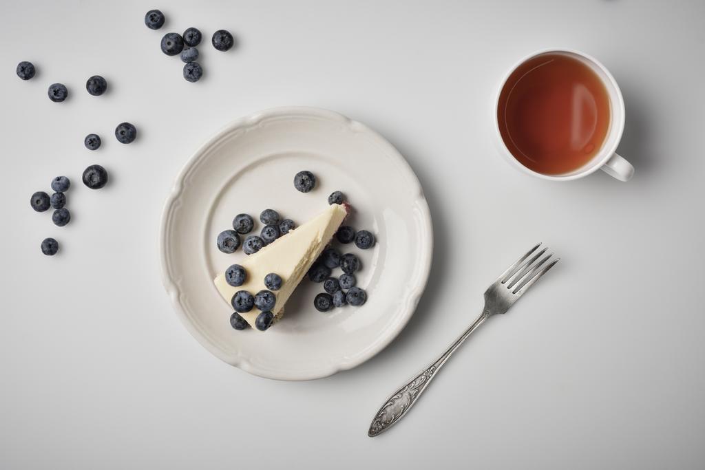 fatia de cheesecake com mirtilos
 - Foto, Imagem