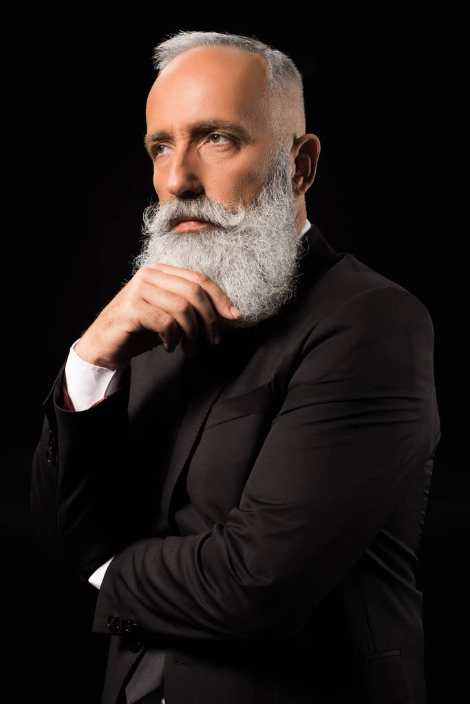 üzletember elgondolkodva megható szakáll  - Fotó, kép