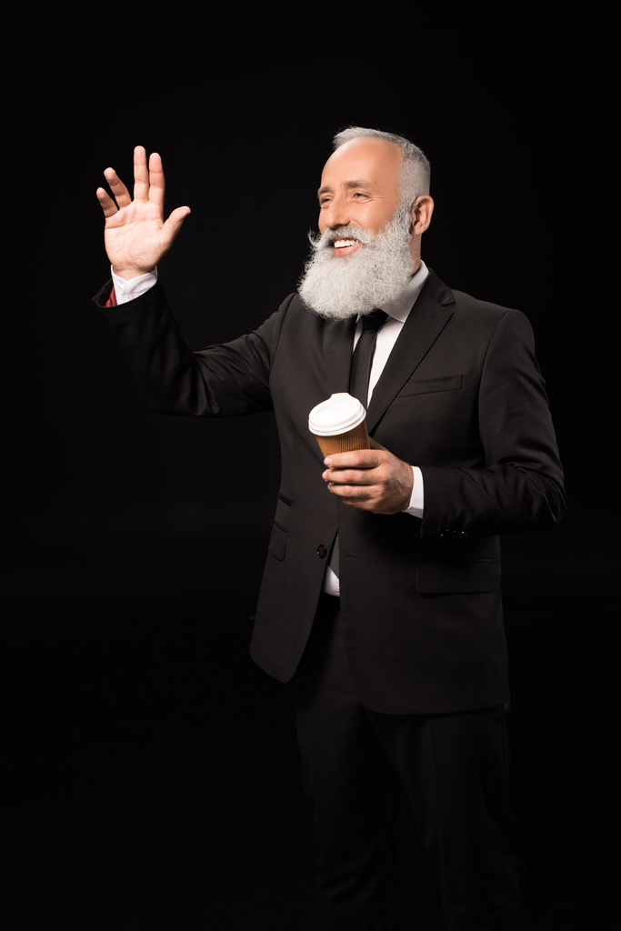 hombre de negocios con café saludando la mano
 - Foto, imagen