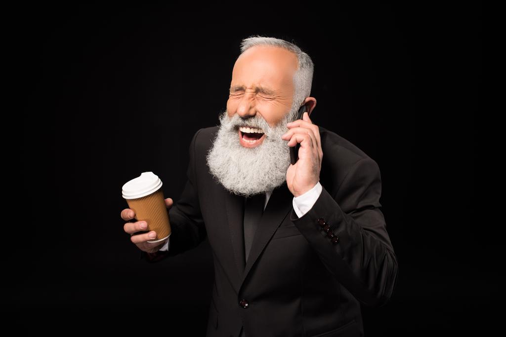 Сміється бізнесмен розмовляє по телефону
 - Фото, зображення