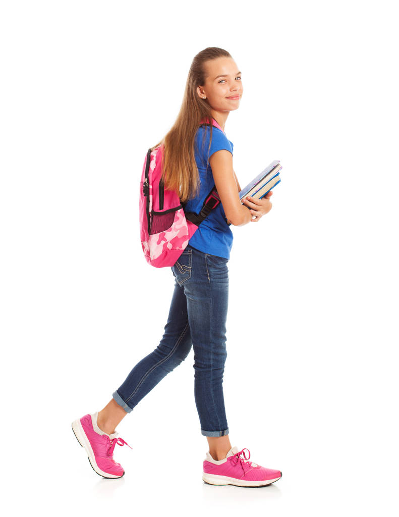 Okul: Sevimli kız öğrencinin ders kitapları ile yürüyüş - Fotoğraf, Görsel