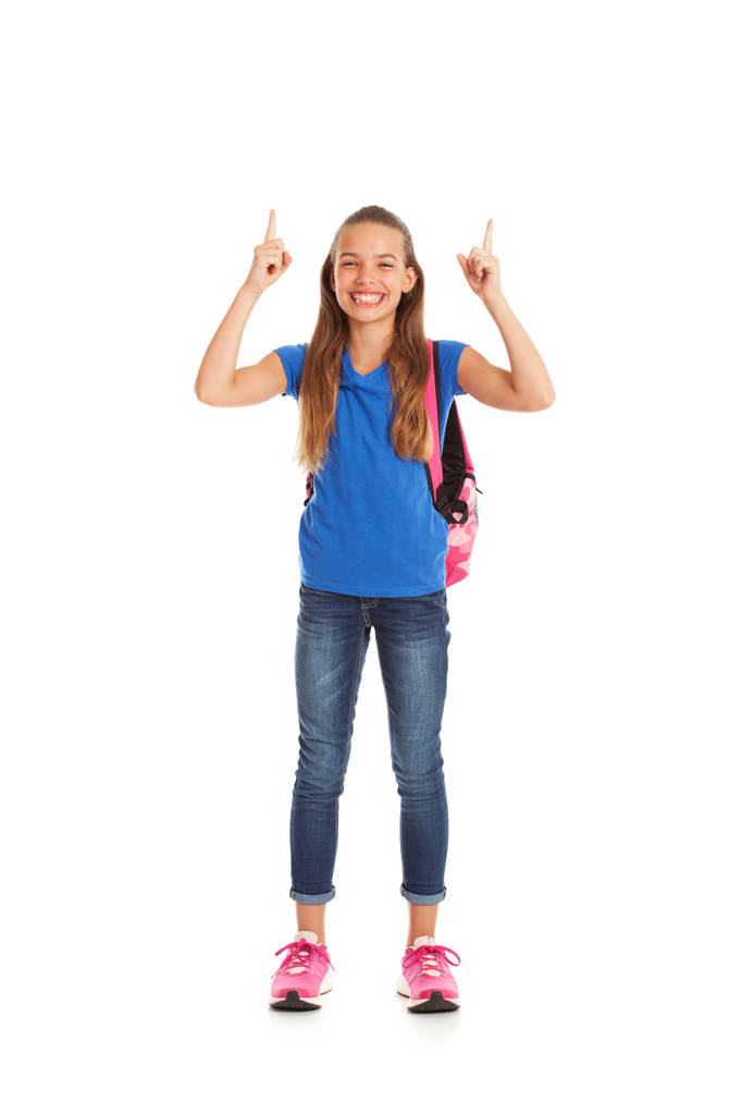 School: Meisje met grote glimlach gebaren naar boven - Foto, afbeelding