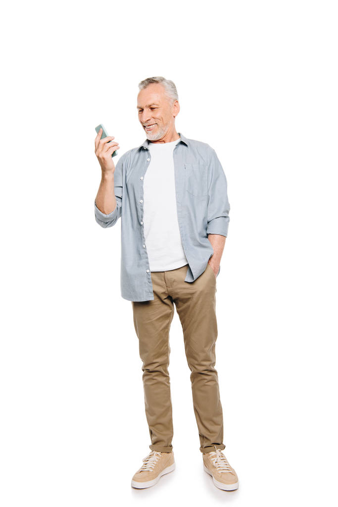 Усміхнений старший чоловік зі смартфоном
 - Фото, зображення