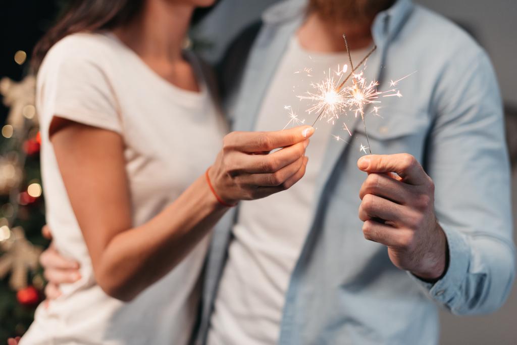 young couple with sparklers - Photo, Image