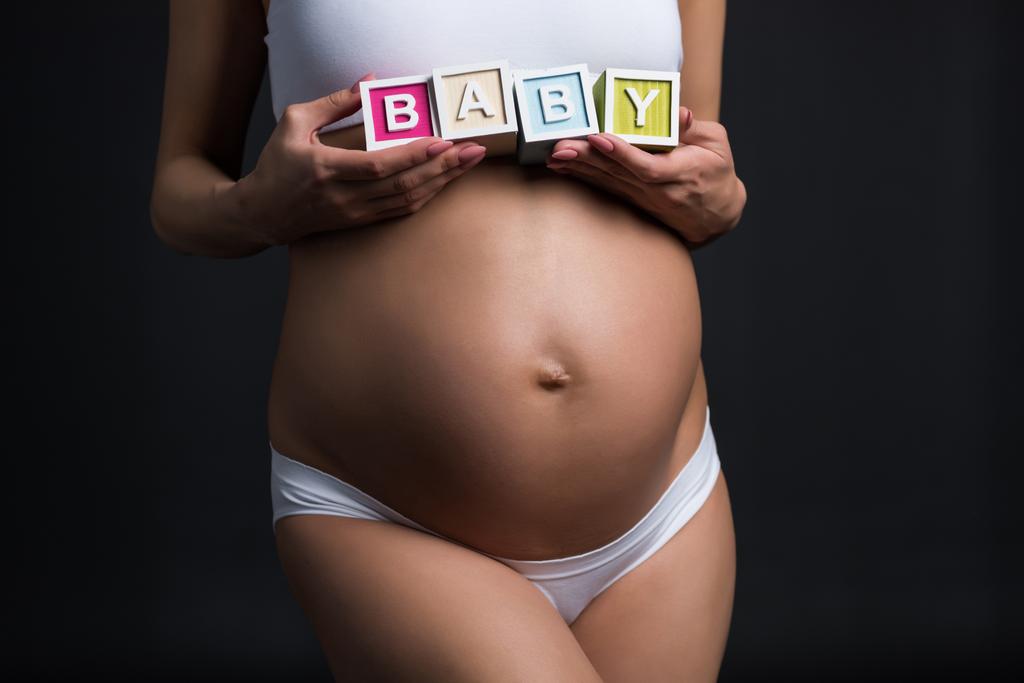 femme enceinte avec mot bébé
 - Photo, image