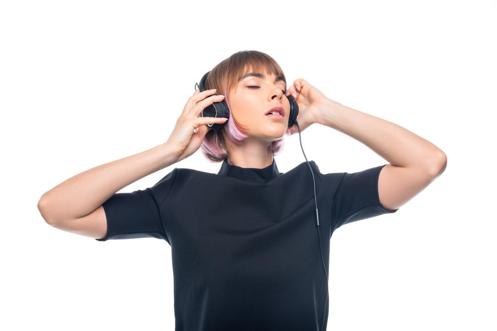 Девушка слушает музыку в наушниках
 - Фото, изображение