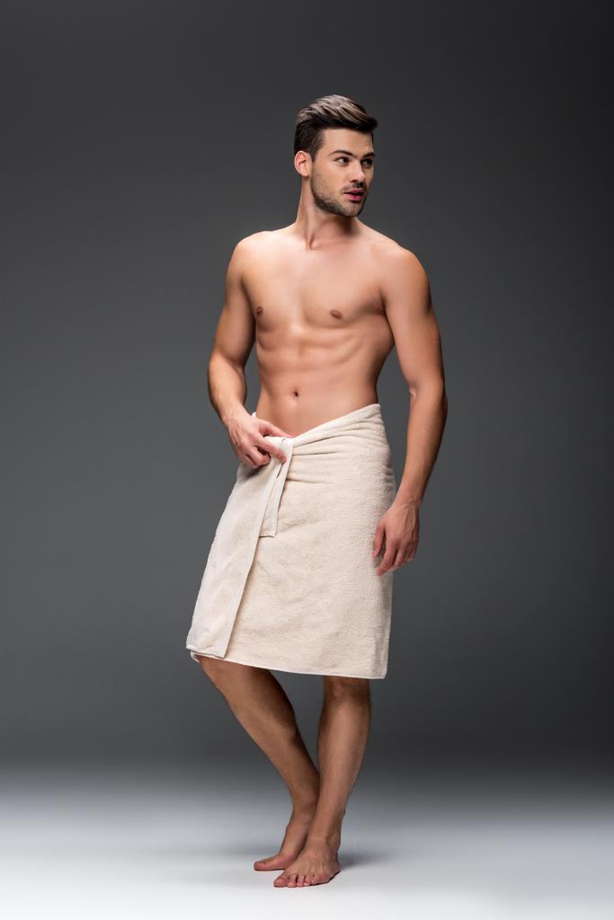 man covering with towel after shower - Photo, Image