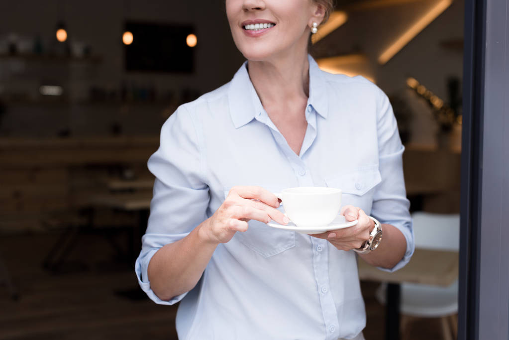 mature woman drinking coffee - Photo, Image