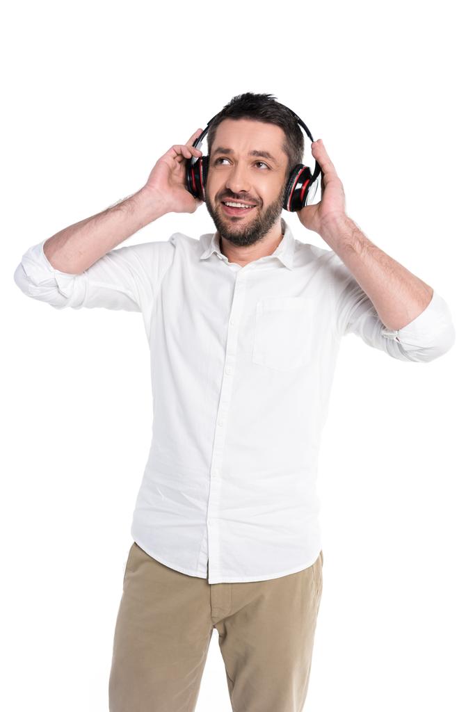 усміхнений чоловік у великих навушниках
 - Фото, зображення