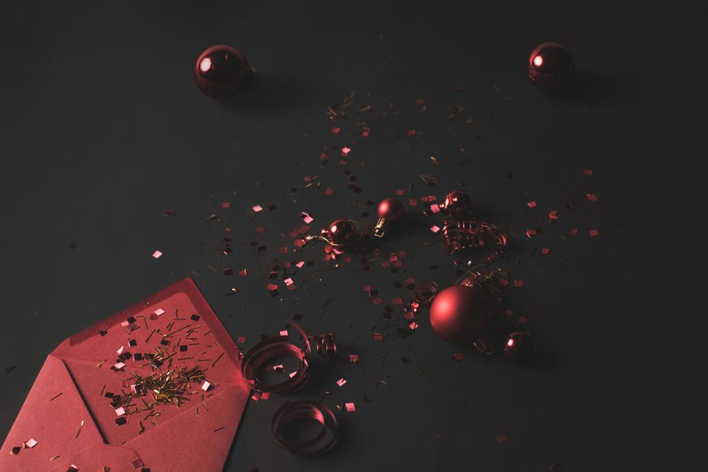 christmas balls, confetti and envelope - Photo, Image