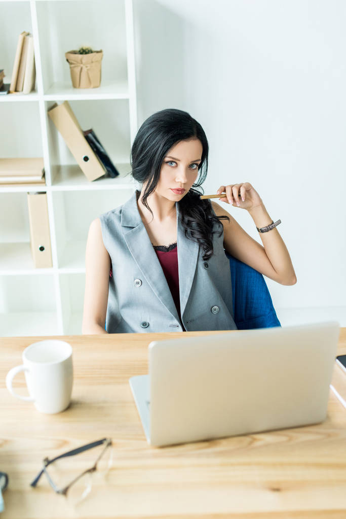 businesswoman at workplace with laptop - Photo, Image