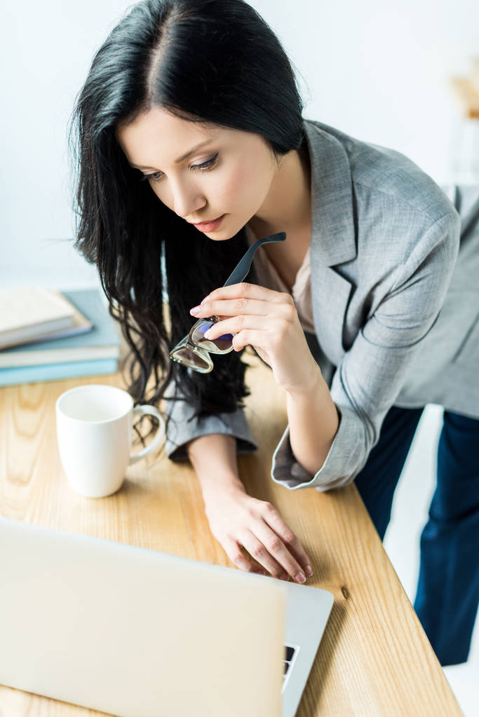 businesswoman working on laptop in office - Photo, Image