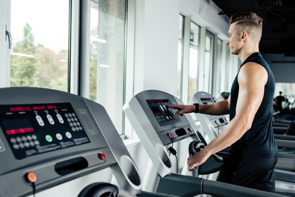 sportsman training on treadmill - Photo, Image
