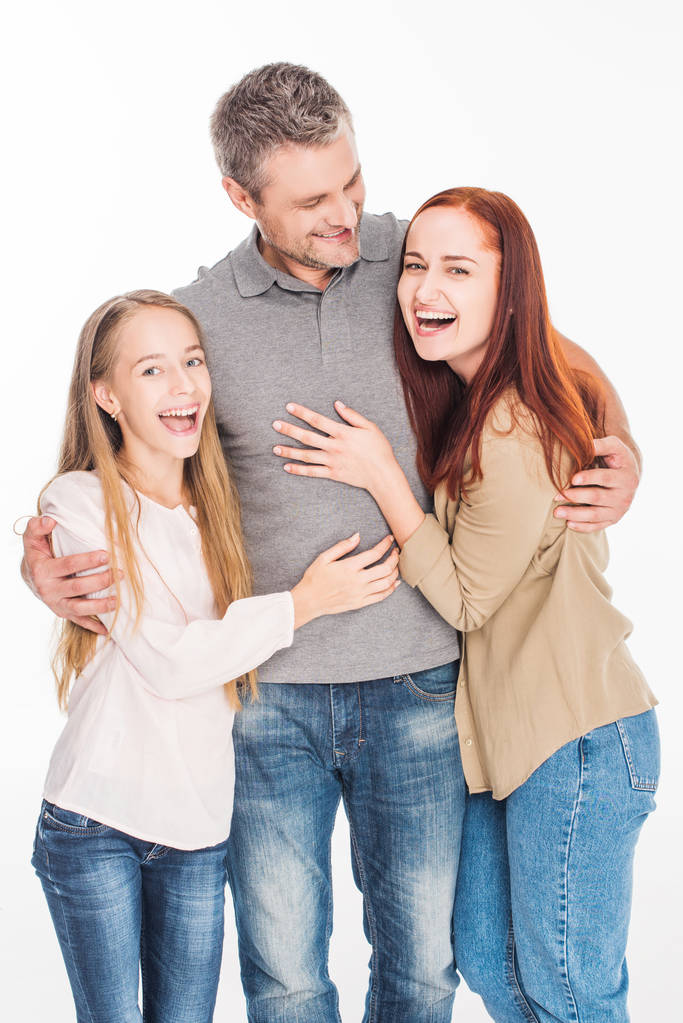 excited family embracing together - Photo, Image