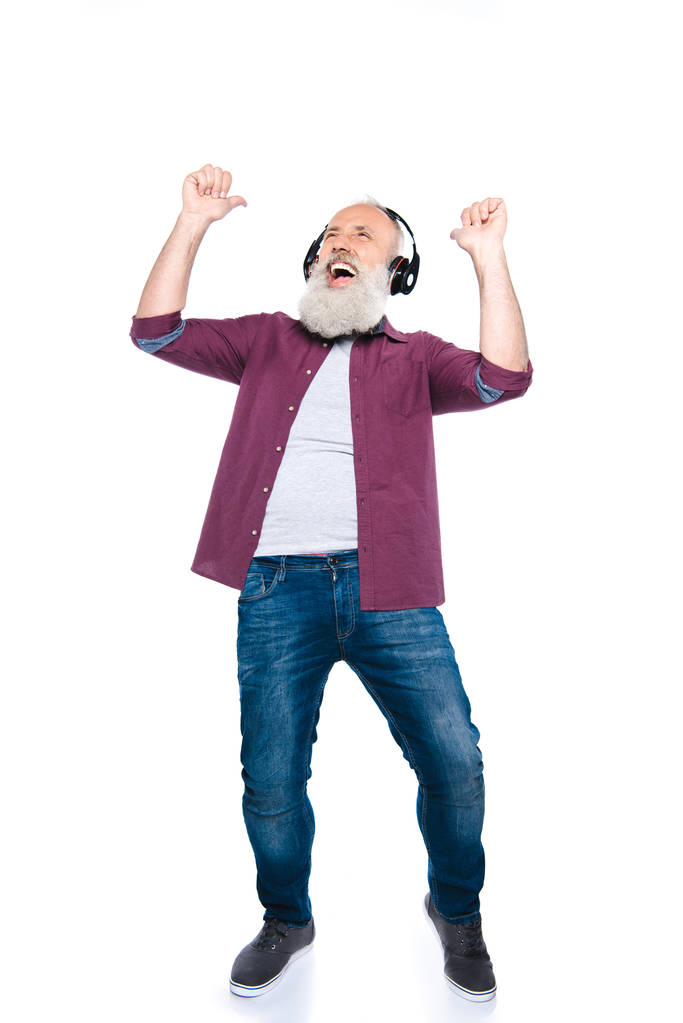 starszy człowiek, taniec ze słuchawkami - Zdjęcie, obraz