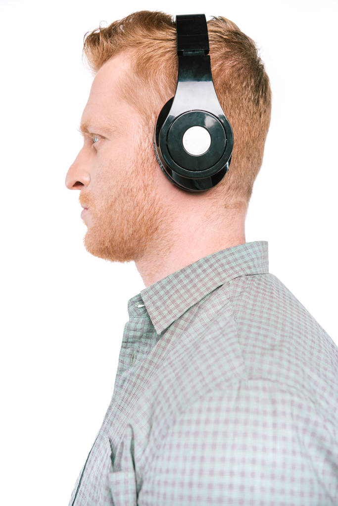 Чоловік слухає музику з навушниками
 - Фото, зображення