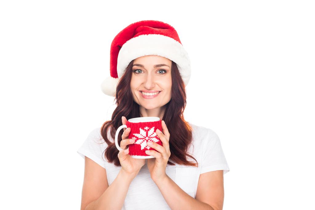 Noel Baba şapkası ile kahve fincanı kadında - Fotoğraf, Görsel
