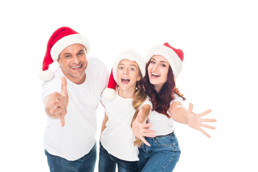 Happy family in Santa hats - Photo, Image