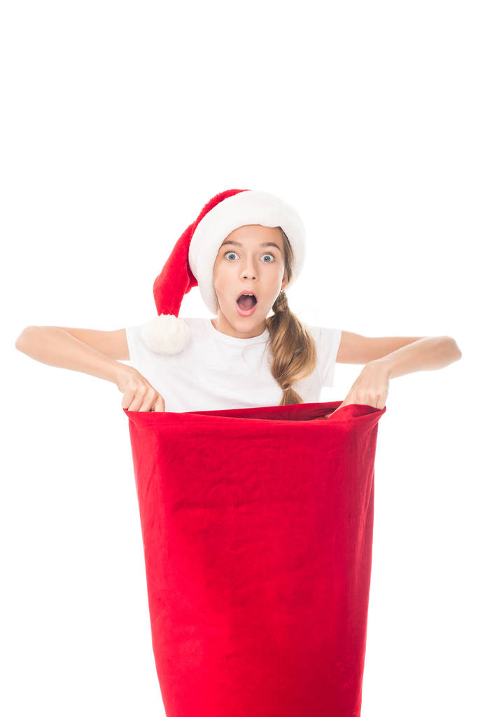 sorprendido adolescente con bolsa de Navidad
 - Foto, imagen