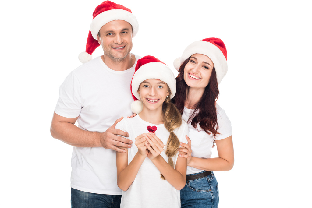 サンタ・ハットの幸せな家族  - 写真・画像
