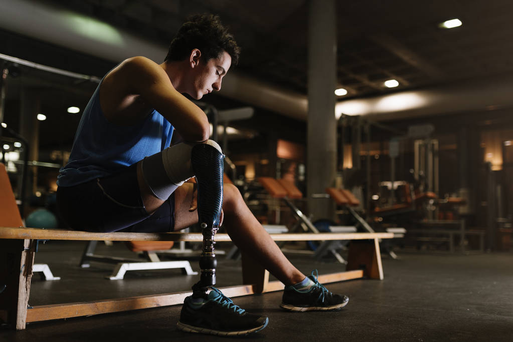 Portrait of disabled young in the gym. - Photo, Image
