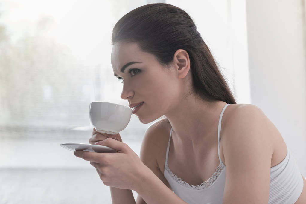 Жінка з чашкою кави
 - Фото, зображення