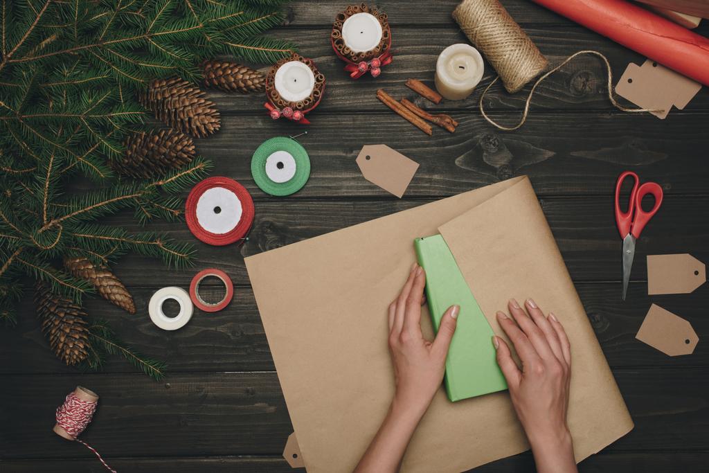 woman wrapping christmas gift - Photo, Image