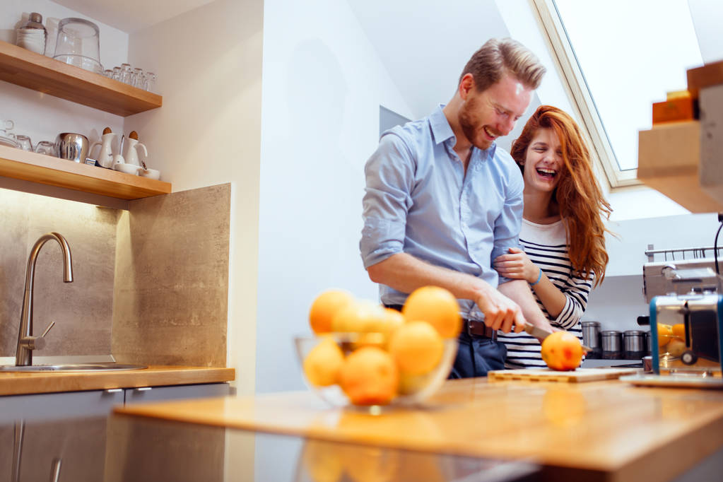 Couple in kitchen together - Photo, Image