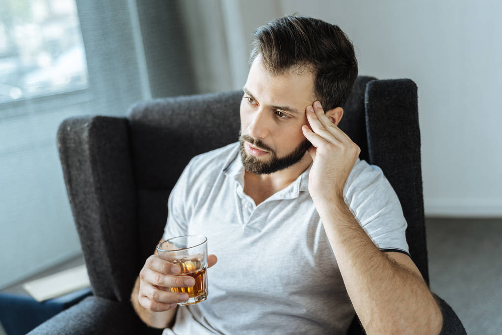 Sad upset man drinking alcohol - Photo, Image