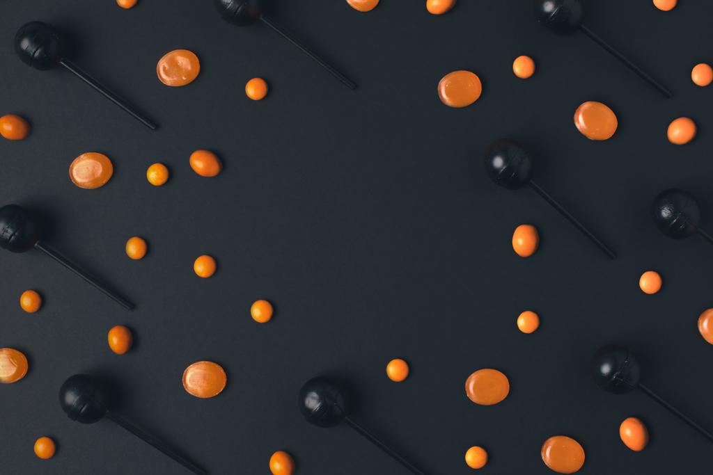 Черные и оранжевые леденцы
  - Фото, изображение