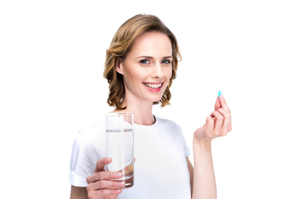 žena s vodou a pilulka - Fotografie, Obrázek