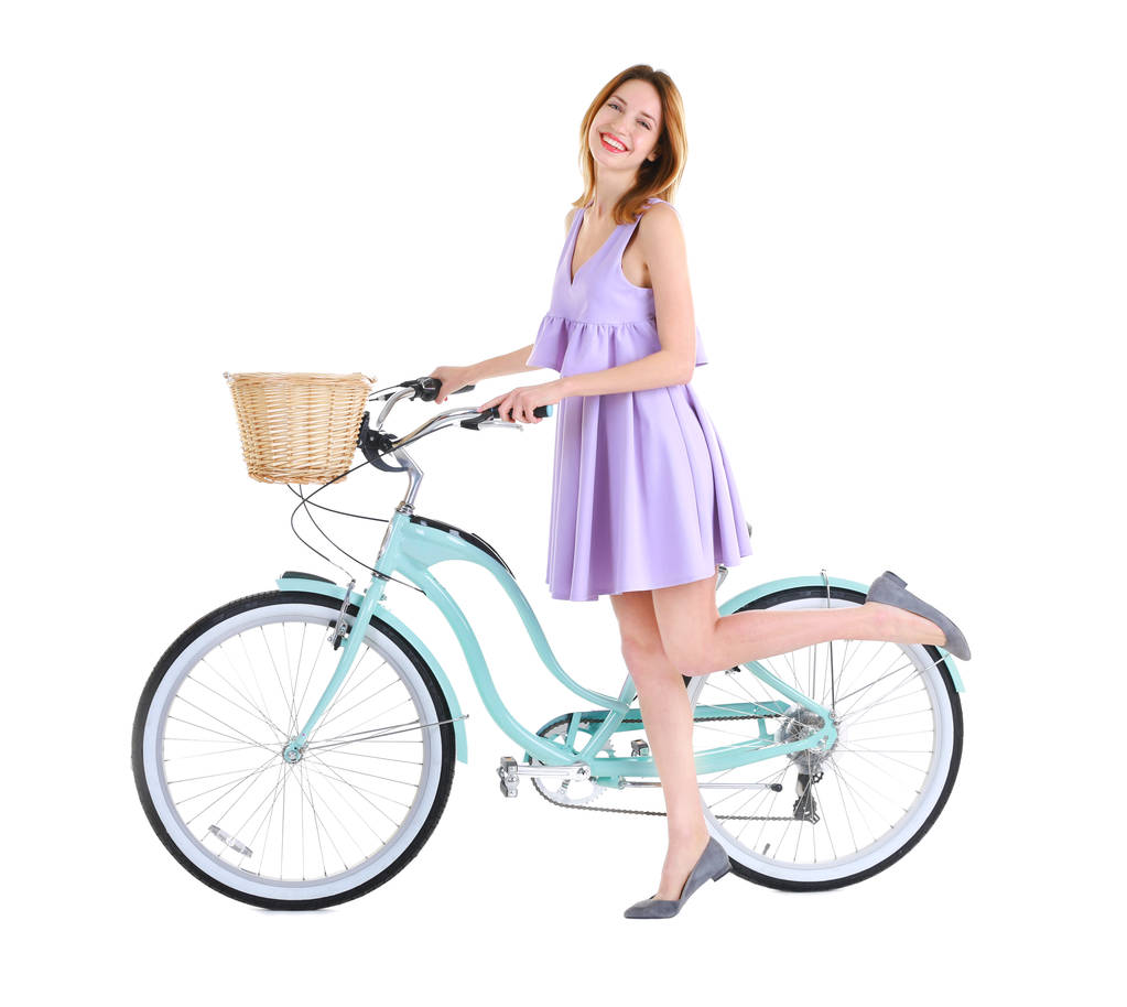 自転車と笑みを浮かべて少女  - 写真・画像
