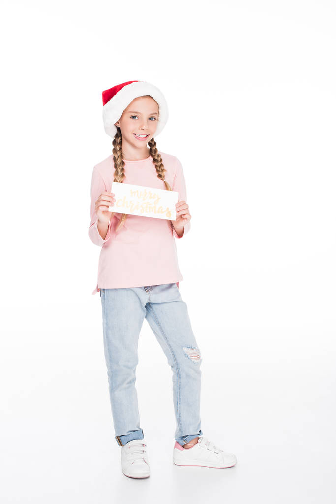niño con tarjeta de Feliz Navidad
 - Foto, Imagen