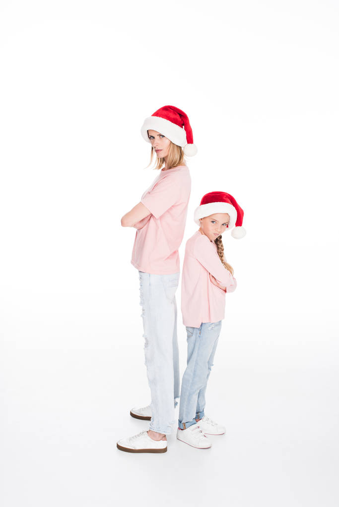 Grumpy mother and daughter on christmas - Photo, Image