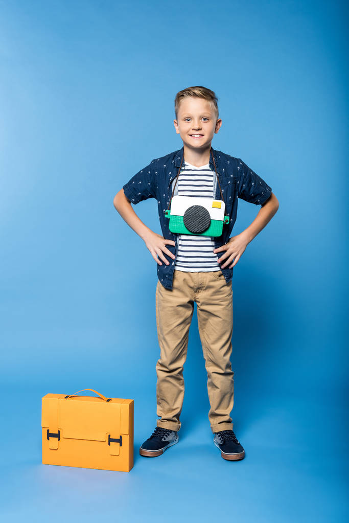 boy with briefcase and camera - Photo, Image