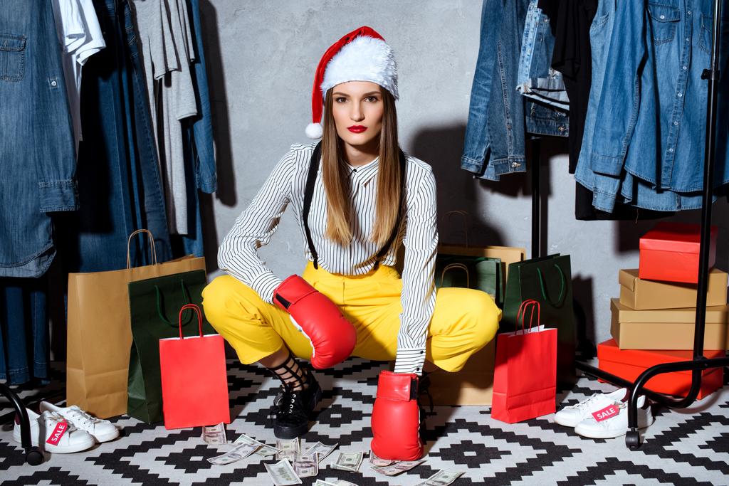 girl in santa hat in boutique - Photo, Image