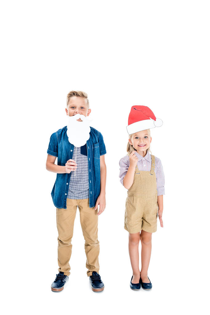 enfants avec chapeau de Père Noël et fausse barbe
 - Photo, image
