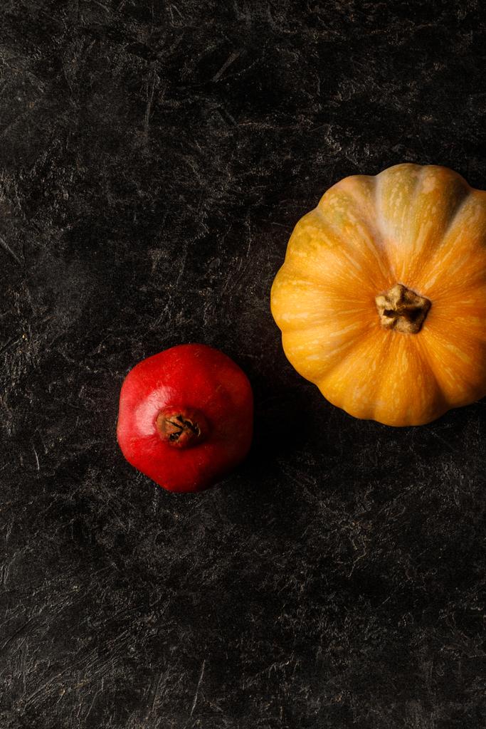 autumnal pomegranate and pumpkin - Photo, Image