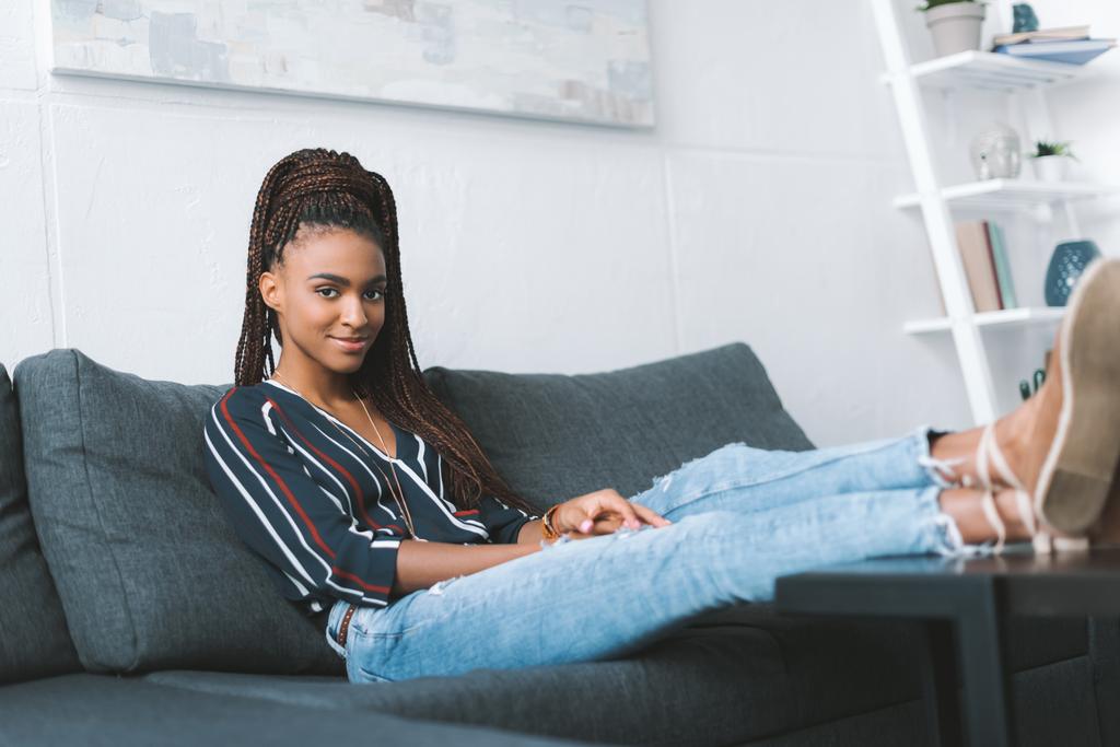 woman relaxing on couch at home - Photo, Image
