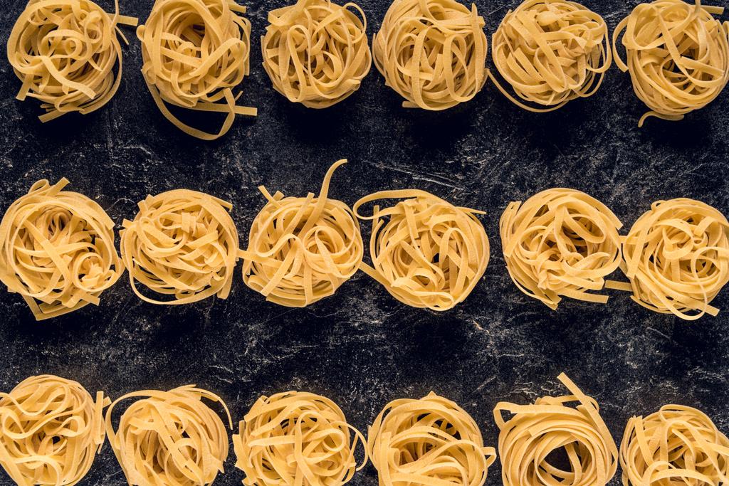 pasta nests in rows - Photo, Image