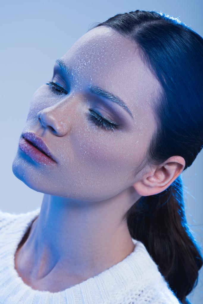 Young woman with frost on face - Photo, Image