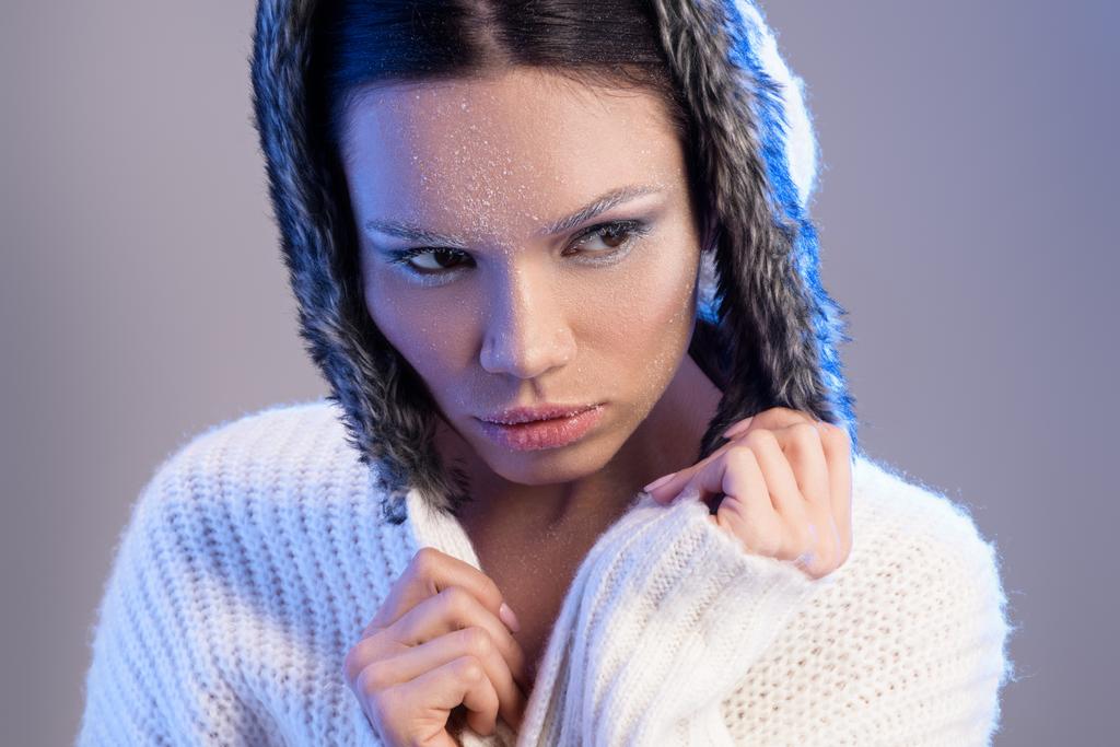 woman with frost on face in sweater - Photo, Image