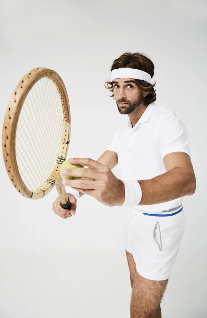 Tennis player ready to serve tennis ball - Photo, Image