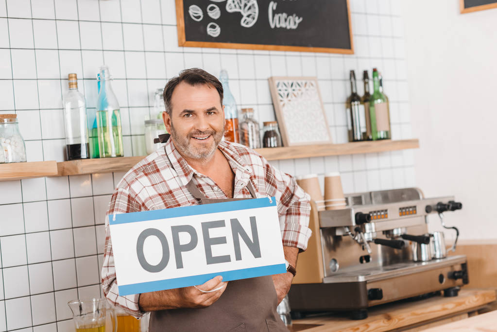 bartender with open signboard - Photo, Image