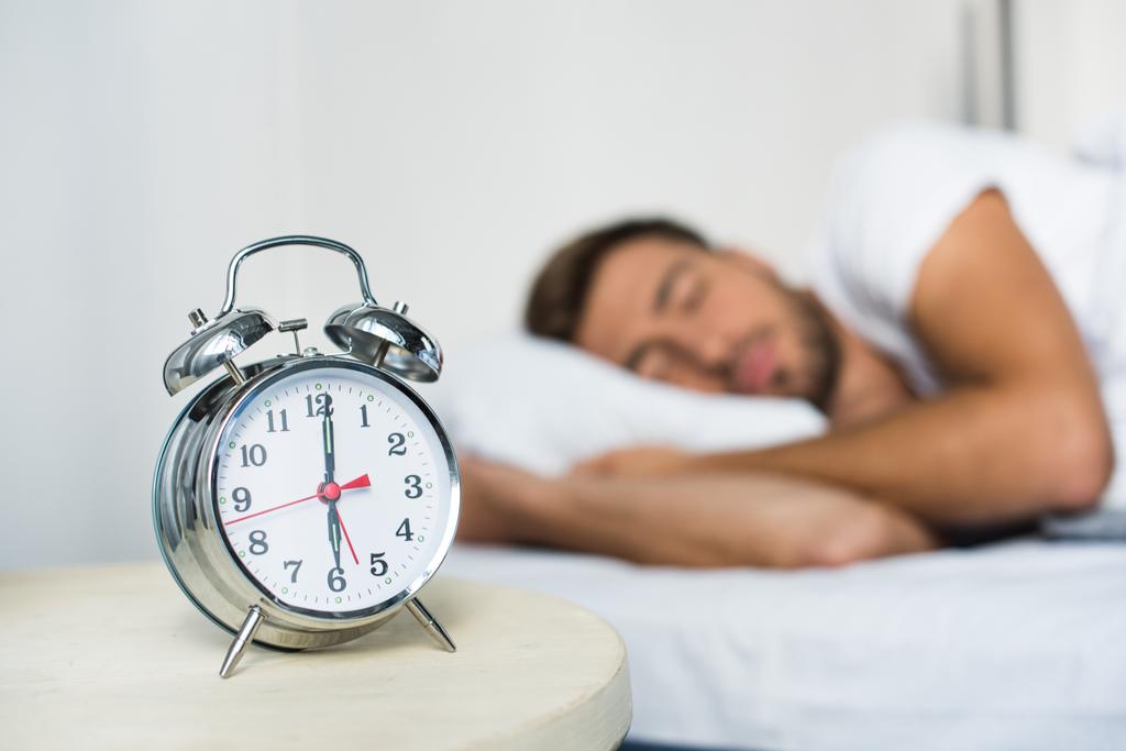 alarm clock on bedside table - Photo, Image