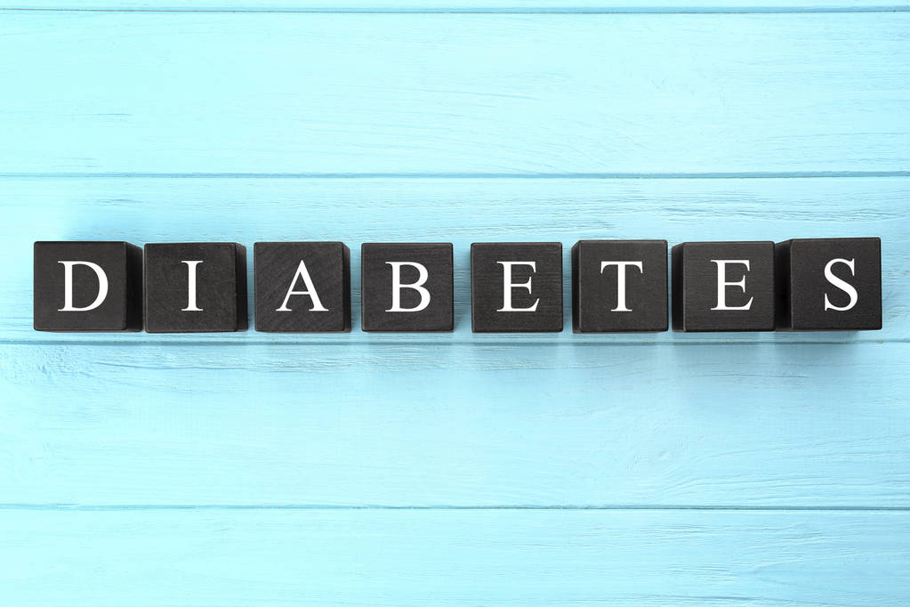 Sana Diabetes valmistettu tummista kuutioista
 - Valokuva, kuva