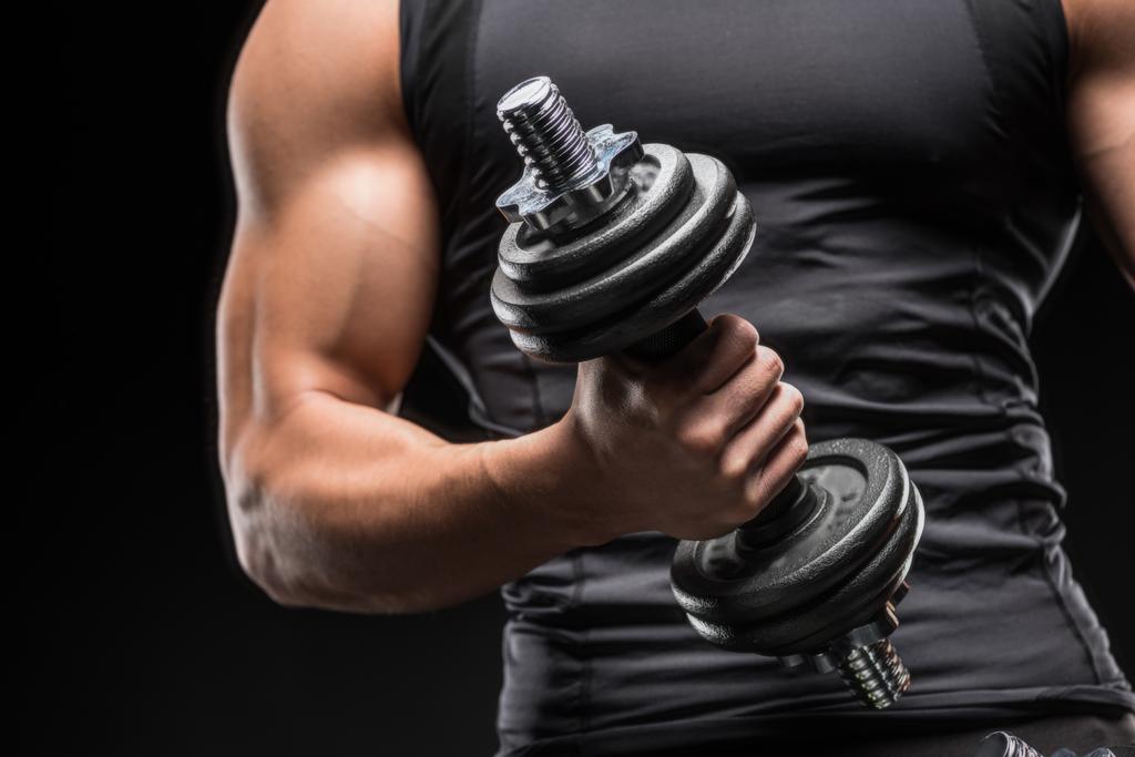 muscular man with dumbbell - Photo, Image