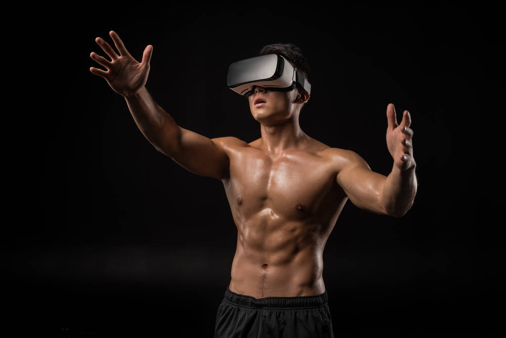 muscular man in vr headset - Photo, Image